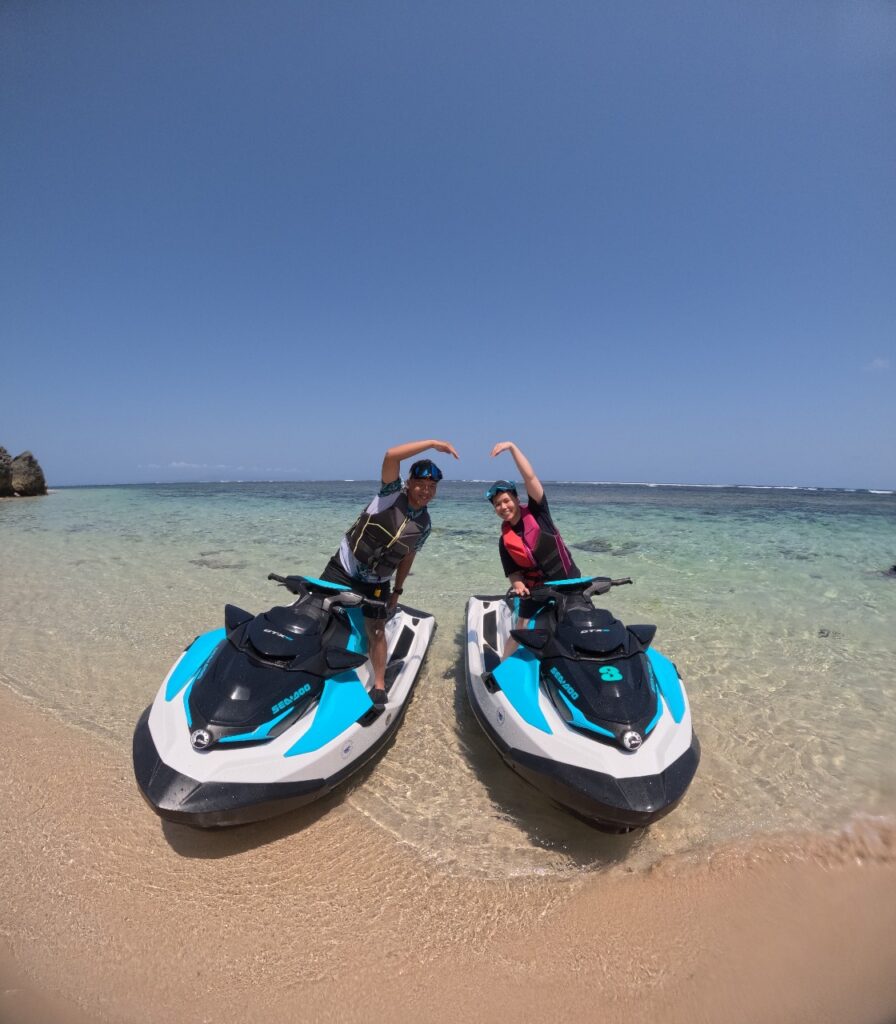 Two jet skis parked on a quiet beach Bali